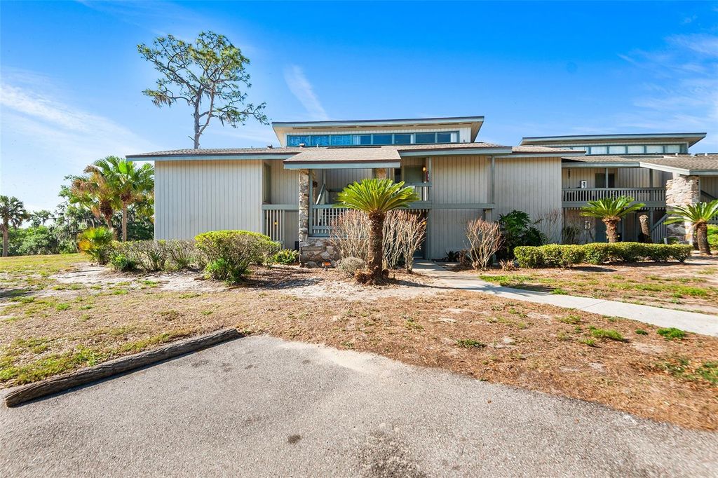 Photo of 2115 Corner Lake Drive #E, Haines City, FL 33844 (MLS # TB8494250)