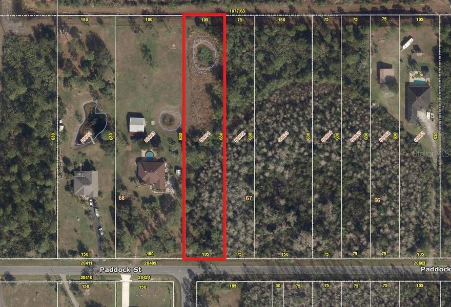 1.52 acres - roughly .7 acres of Uplands throughout parcel per previous report.
