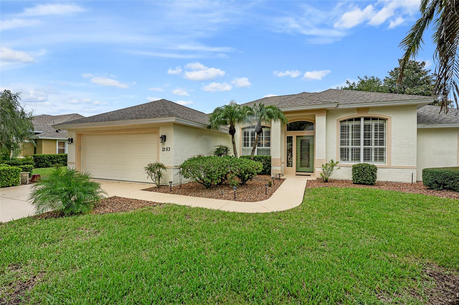 Coventry Model with a 2024 ROOF, resurfaced POOL in 2023 & NEWER HVAC. Home has a separate dining room and den/flex room with a closet. Family room with a propane fireplace, sliders to your covered lanai & pool. Electrical outlet in floor for your recliners! The kitchen has a breakfast bar, granite counter tops & a large pantry, plus an eat in kitchen. The master bedroom has tray ceilings, walk in closet & a walk out to the lanai and a pond view. The ensuite has double vanities, shower & bathtub. Split bedrooms for family & guest privacy that share a full bath that has pool access. Extend your family living space on the lanai, beautiful pool & a fantastic view of the pond. Crown molding & diagonal tile flooring. Oversized garage with a side garage entrance, perfect for your golfcart or bikes. Come join the Plantation Bay lifestyle! 45 holes of golf, tennis, pickleball, 2 pools, cabana, spa/fitness center and the New Clubhouse! Buyers of this home will receive a substantial discount on the initiation fees when you join within 30 days of closing!