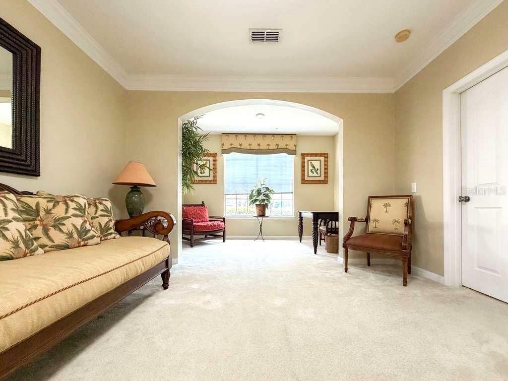 Photo of 12843 Madison Pointe Circle #107, Orlando, FL 32821 (MLS # S5144095)