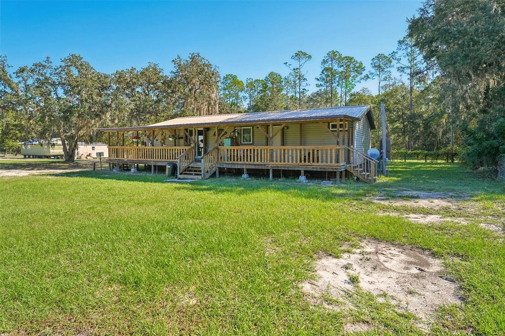 Photo of 879 Cousintown Road, Interlachen, FL 32148 (MLS # FC322245)