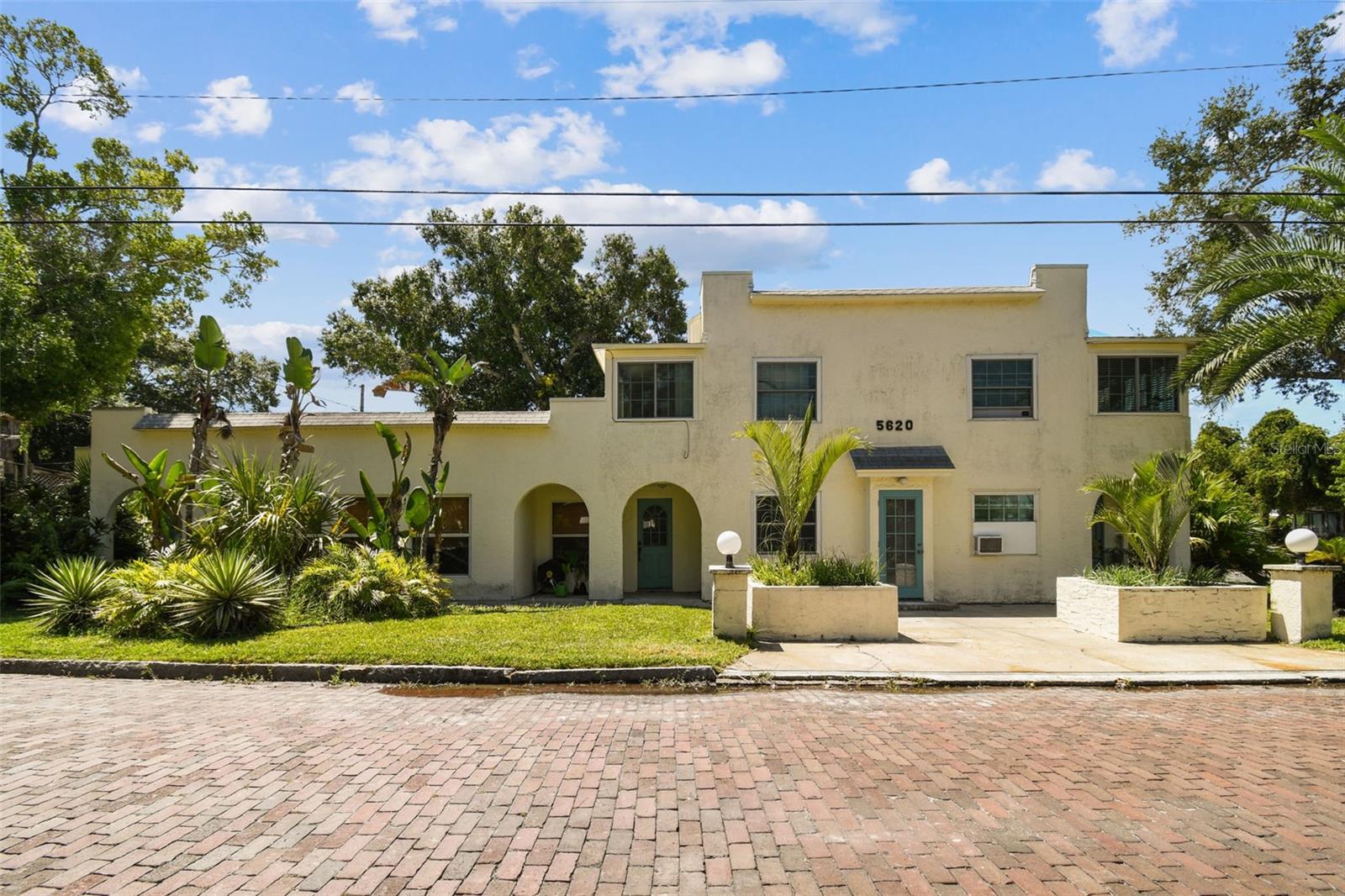 Welcome to this Historic Mediterranean Revival beach property with pool + spa. This 2nd level unit with large covered private balcony is the perfect mix of charm and convenience in absolute prime location of Gulfport. Nestled in a boutique 5-unit property- just 2 blocks off the main Gulfport strip, and 3 blocks from Gulfport Beach, this end unit is filled with natural light and thoughtfully updated with modern coastal finishes throughout.
Enjoy a bright living space, updated flooring, designer accent walls, and stylish updates. The entry space offers a separate area for dining, bar setup, additional storage, and potential dedicated pet zone. Around the corner you’ll find the coastal chic kitchen equipped with quartz countertops, stainless appliances, glass subway backsplash, chef style faucet, and large sink workstation. Past the kitchen is a great little bonus space, perfect for an office setup, reading nook, or personal yoga area.
The bedroom accommodates a queen bed with nightstands, features a beautiful sliding barn door and large walk-in closet. The connecting bathroom has charming Mediterranean style tile flooring, floating shelves, and shower tub combo.
Step outside to enjoy a tropical courtyard with screened-in lanai, pool and spa. Also just off the courtyard is your personal assigned parking on the driveway with bikerack, and plenty of street parking available for guests on this oversized corner lot. Walk or bike to Gulfport’s vibrant downtown, weekly markets, restaurants, and waterfront parks. Whether you’re looking for a full-time residence, seasonal retreat, this turnkey unit offers flexibility and location in one of Gulfport’s most desirable neighborhoods. Available furnished or unfurnished.