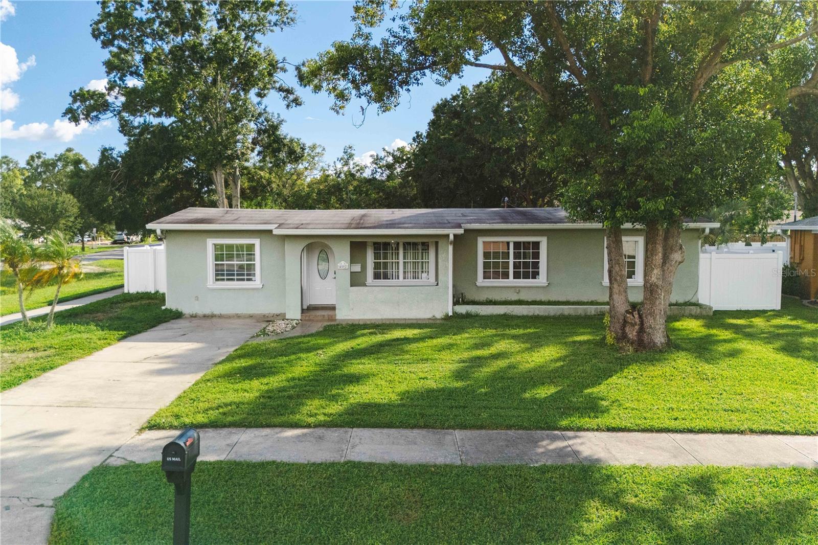 Welcome to this spacious 4-bedroom, 2-bath corner-lot home in a highly desirable family-friendly neighborhood! Built with solid block construction, this residence offers 1,680 sq. ft. of living space under A/C and a total of 2,120 sq. ft., giving you comfort and functionality throughout. Enjoy the large backyard—perfect for outdoor gatherings, gardening, or creating your dream entertainment area. With no HOA, no flood zone, and plenty of privacy, this property provides flexibility and peace of mind. Inside, you’ll find a bright and open layout ideal for modern living. The split-bedroom floor plan ensures comfort for everyone, while the generous living, dining and Florida room areas make hosting a breeze. Conveniently located just minutes from Tampa International Airport, Downtown Tampa, the International Plaza Mall, top-rated schools, hospitals, parks, and major highways including I-275, this home combines easy access with everyday convenience. Don’t miss the opportunity to own this beautiful home in one of Tampa’s most connected and vibrant areas—schedule your private showing today!