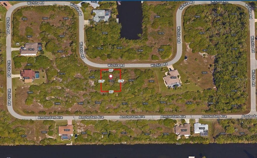 Auction Property. This is an Auction Property. The auction is scheduled for February 2 at 3:00 PM. It will be held at the Charlotte Harbor Event & Conference Center 75 Taylor St. Punta Gorda, FL 33950. Please note that the listed price may not reflect the actual sale price, as the final value will be determined at auction. The adjacent  lot 15039 Wichita Rd is another auction lot.  POSSIBLE DOUBLE LOT>

Beautiful homesite in the highly desirable South Gulf Cove boating community. Build your Florida dream home on this affordable dry lot and enjoy all the benefits of a waterfront neighborhood without the waterfront price tag.

Located in a deed-restricted community of approximately 15,000 home sites with over 4,000 waterfront lots and 55 miles of navigable canals leading to Charlotte Harbor and the Gulf of Mexico through the community lock system. Central water and sewer are available to all buildable lots, and owners have access to the community boat ramp, parks, and walking areas, making it easy to launch your boat, kayak, or paddleboard and live the Southwest Florida lifestyle.

This property offers convenient access to beaches, golf courses, shopping, restaurants, and marinas in Englewood, Port Charlotte, and Boca Grande, all while being surrounded by newer construction homes and well-kept properties that help protect long-term value. Whether you are ready to build now or just want to secure an attractive home site for the future, this South Gulf Cove lot is an excellent choice for both personal use and investment.

--