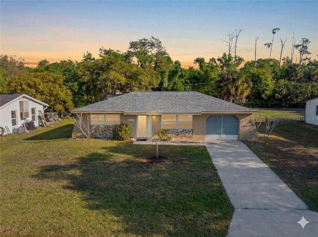 Photo of 20222 Gladstone St Ave, Port Charlotte, FL 33952 (MLS # C7524168)