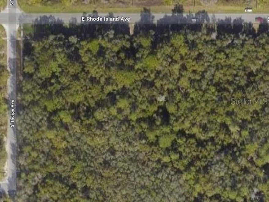 This vacant land in Orange City offers a prime opportunity for development, conveniently located near highways and businesses, making it ideal for commercial or industrial projects. Zoned 4000 Industrial and 7565 - Orange City Commercial, it provides flexibility for various business ventures. Its strategic location enhances accessibility and visibility. This property is a valuable asset for investors or entrepreneurs looking to establish or expand their presence in the West Volusia area.