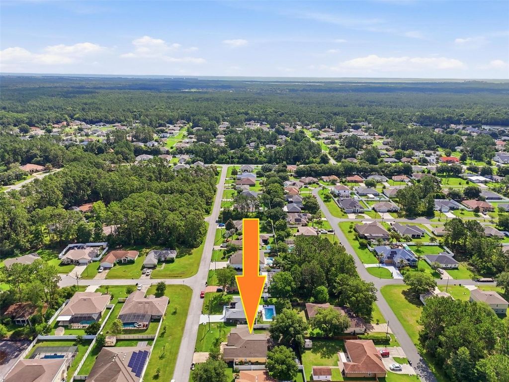 Photo of 10 Larkspur Way, Palm Coast, FL 32137 (MLS # FC319335)