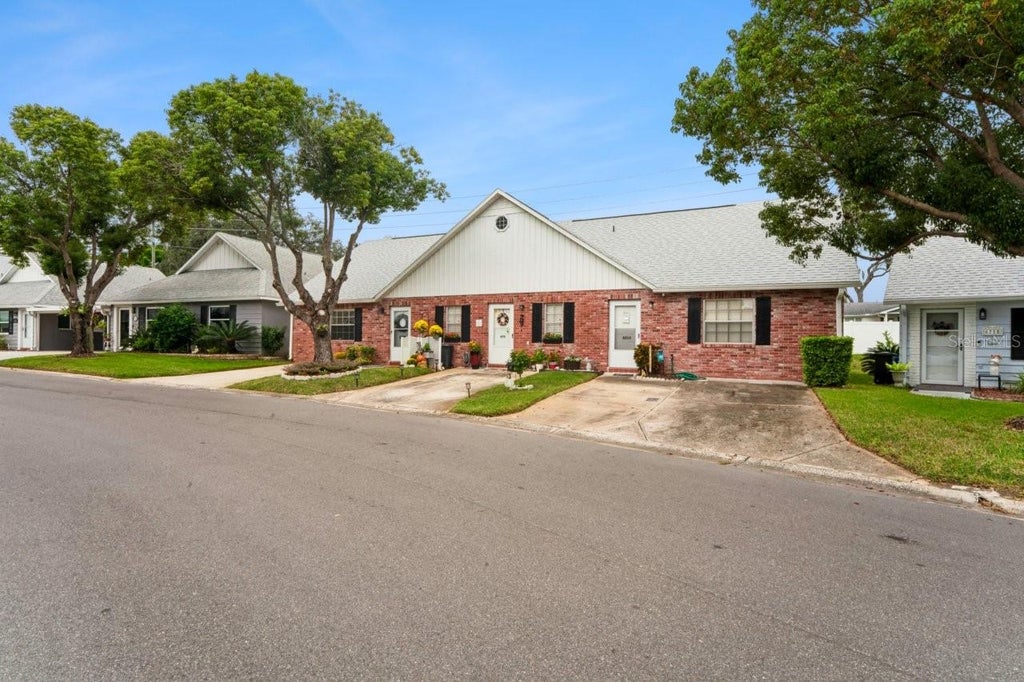 Photo of 6709 Devonshire Ln #10A, New Port Richey, FL 34654 (MLS # W7890035)