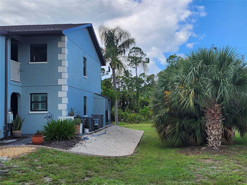 Photo of 87 Boundary Boulevard #7, Rotonda West, FL 33947 (MLS # D6148494)