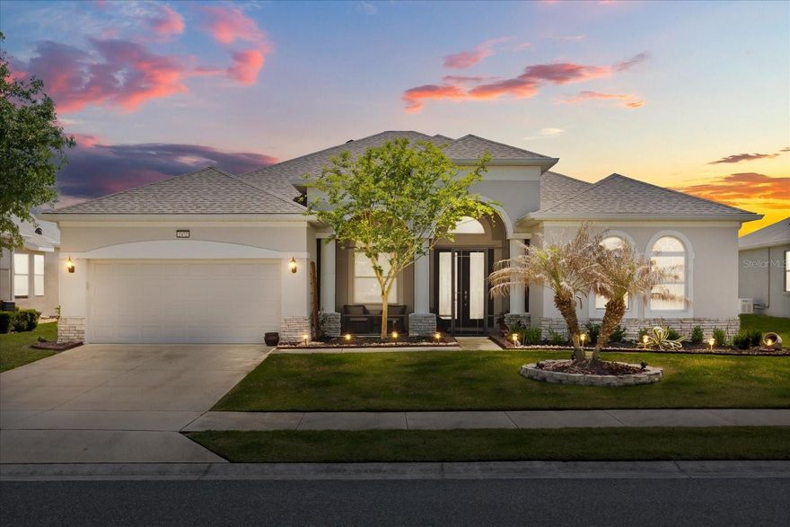 Welcome to effortless Florida living in the highly sought after gated 55+ community of Lakes of Mount Dora. This vibrant, amenity rich neighborhood is known for its active lifestyle, beautifully maintained grounds, and strong sense of community. Situated on the water, this immaculately maintained one story residence offers both elegance and functionality with a thoughtfully designed split floor plan and no stairs. From the moment you enter, you are greeted by a dedicated and expansive primary wing to your right, featuring a massive private office, a spacious primary bedroom, and a well appointed en suite bath, creating the perfect retreat for work and relaxation. On the opposite side of the home, additional bedrooms provide privacy and flexibility for guests. The heart of the home is a stunning custom kitchen expansion, designed for both everyday living and entertaining, with elevated finishes and generous space that truly sets this home apart. Every detail reflects pride of ownership and meticulous care. Step outside and enjoy peaceful water views, adding to the serene lifestyle this home offers. Residents of Lakes of Mount Dora enjoy resort style amenities including a gorgeous pool, pickleball and tennis courts, shuffleboard, and a wide variety of clubs and social activities that make it easy to stay active and connected. This is more than a home, it is a lifestyle. All information deemed accurate but should be verified by buyer and or buyer’s agent.