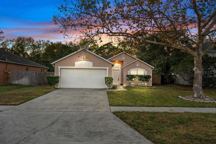 Welcome home to this beautifully maintained 3-bedroom, 2-bath residence in the heart of Apopka. Nestled in a quiet, desirable neighborhood, this inviting home offers the perfect blend of comfort and convenience. The open kitchen features a breakfast bar, stainless steel appliances, and ample cabinet and counter space, seamlessly connecting to the main living areas. The spacious primary suite boasts a walk-in closet, en-suite bath with garden tub and separate shower, plus direct access to the backyard. Enjoy outdoor living in the fully fenced backyard—ideal for entertaining, pets, or relaxing evenings. Additional highlights include a two-car garage with washer and dryer, an irrigation system, a new water heater 2025 and A/C replaced in 2015. Conveniently located just minutes from Wekiwa Springs State Park, major highways, top-rated schools, shopping, dining, and a short drive to Orlando’s world-class attractions. Schedule your showing today—this home won’t last!