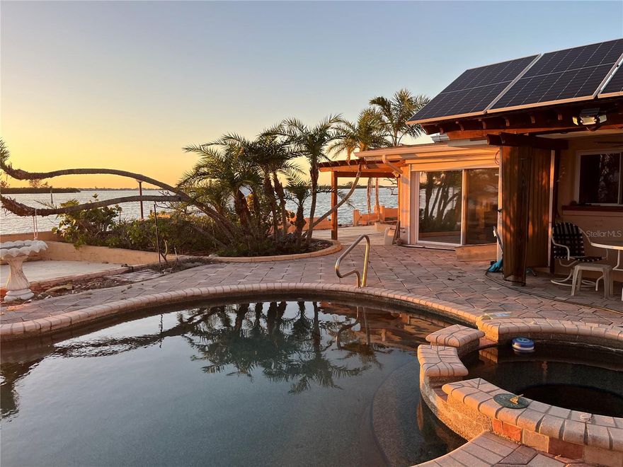 Dream Waterfront Opportunity on the Intracoastal — 130’ of Open Water Views
Welcome to 1844 Venetian Point Drive, a rare waterfront gem nestled on a quiet cul-de-sac in one of Clearwater’s most coveted neighborhoods. This expansive 1.5-lot over one third acre property offers unmatched 130 feet of wide-open Intracoastal frontage, delivering breathtaking west-facing sunsets and panoramic views of Island Estates, Clearwater Beach, and Caladesi Island State Park.

Endless Outdoor Living
Relax poolside, sip cocktails at the two-sided bar in your private cabana or dine al fresco under the gazebo as you watch dolphins and manatees glide by. With multiple outdoor seating areas and lush landscaping, there’s always a perfect spot to soak in the Florida lifestyle — no matter the time of day.

Deep Water Access & Boater’s Paradise
Boating enthusiasts will love the deep-water dock with quick access to the Gulf of Mexico (aka Gulf of America). Cruise the Intracoastal, fish off your dock, or paddle to nearby beaches and islands — it's all just steps away.

Unbeatable Location
Perfectly positioned between Downtown Dunedin and Downtown Clearwater, you’re just minutes from the Pinellas Trail, Honeymoon and Caladesi Islands, Clearwater Beach, golf courses, local restaurants, art festivals, and live music at the new Clearwater Sound Amphitheater.

Ready for Your Vision
The existing 3-bed, 2.5-bath pool home (approx. 2,100 sq ft) experienced water damage during Hurricane Helene and is being sold as-is, creating an exceptional opportunity to rebuild, elevate, or design your custom dream home on one of the largest waterfront lots on Venetian Point Drive.

Don’t miss your chance to own this one-of-a-kind waterfront property in a location that truly has it all — space, views, privacy, and potential.

Measurements are approximate and should be verified.