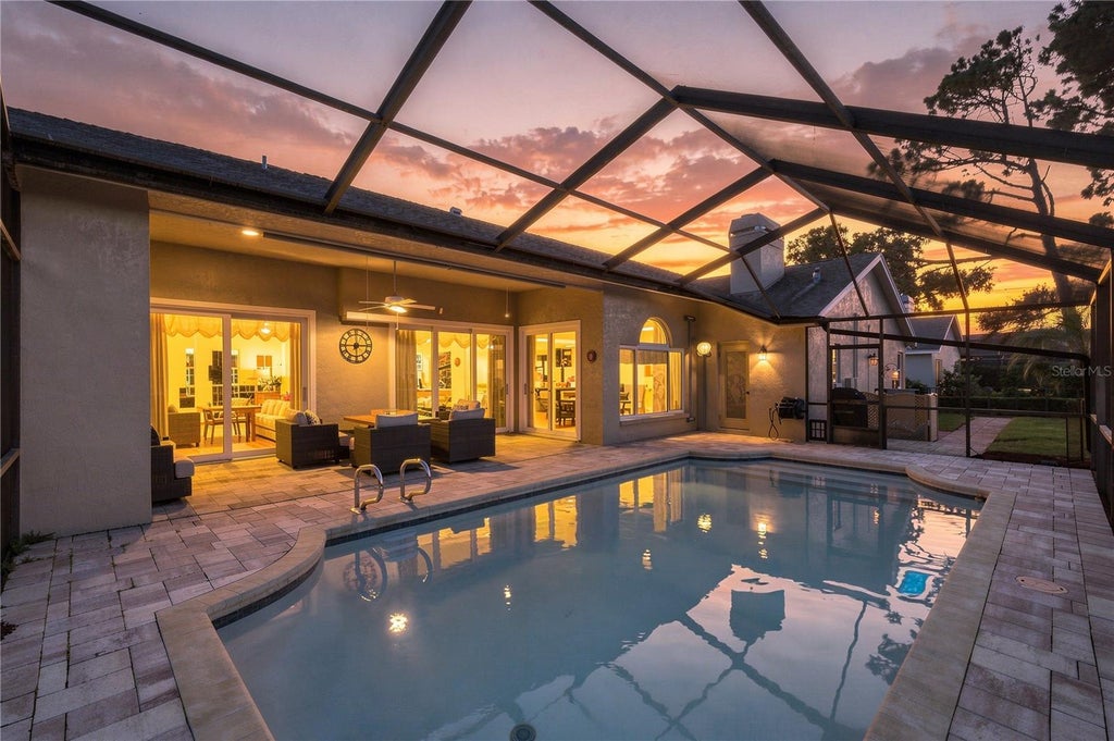 Photo of 679 Litchfield Lane, Dunedin, FL 34698 (MLS # A4704853)