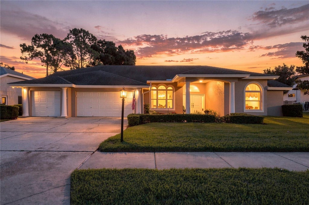 Photo of 679 Litchfield Lane, Dunedin, FL 34698 (MLS # A4704853)