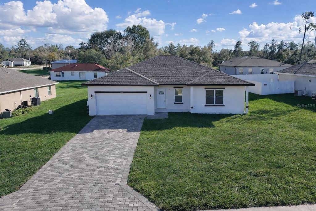 Photo of 2148 SW 155th Lane, Ocala, FL 34473 (MLS # O6369993)