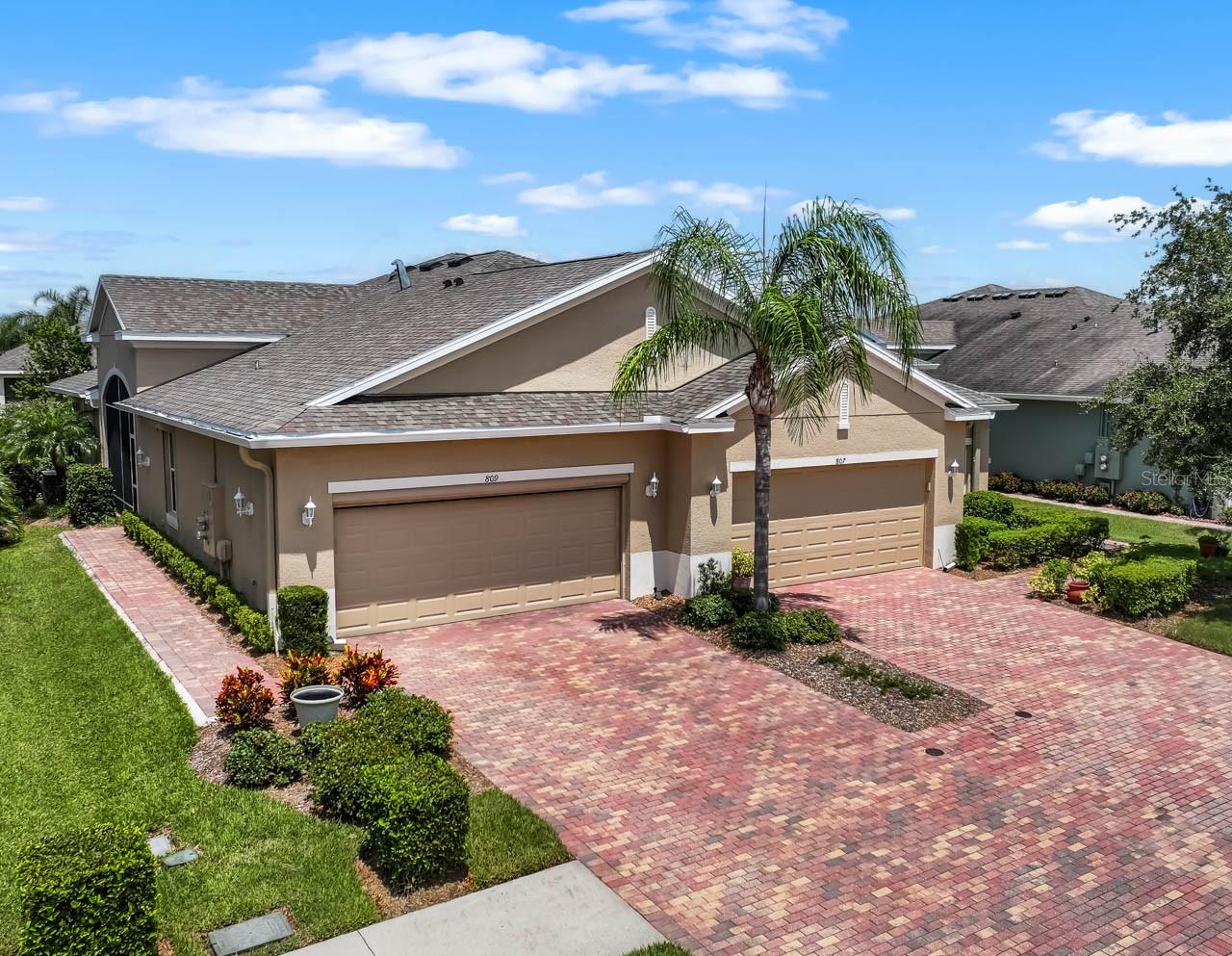 Charming 2-bed, 2-bath, 2-car garage home in the exclusive Verona neighborhood within the golf-friendly community of Renaissance, Sun City Center! This inviting home is an ideal retreat for year-round living or for snowbirds seeking comfort and convenience in a 55+ gated community. The Verona HOA takes care of all exterior maintenance while you’re away, including lawn mowing, weeding, fertilizing, and trimming of bushes and trees. For added peace of mind, the home features easy-to-use roll-down HURRICANE SHUTTERS on every window, providing both storm protection and security. Plus, the HOA covers exterior house painting every 7 years and routine roof replacement! This home is one of the last new builds in Sun City Center, a sought-after golf cart community. It’s MOVE-IN READY with fresh carpets in the bedrooms, NEWLY PAINTED exterior, and professionally maintained grouted tile floors. Unique features include a convenient push-button ROLL-DOWN SCREEN on the garage door and SOLAR SHADES on the lanai. There’s also space behind the home to add a birdcage if desired. With 2 bedrooms, 2 bathrooms, and a bonus TWO-PERSON OFFICE featuring built-in cabinets and GRANITE countertops, this villa offers ample living space. The spacious kitchen boasts plenty of WOOD CABINETS, drawers, a BREAKFAST BAR, stylish backsplash, and under-cabinet lighting! There are TRAY CEILINGS in the living room and primary bedroom, and NEW SLIDERS leading out to the COVERED & SCREENED LANAI. There's even a covered and screened entryway with a beautiful walkway connecting to the paver driveway! The primary bedroom features an EN-SUITE BATHROOM complete with DUAL-SINK VANITY, water closet, beautifully tiled shower with bench, and a grand WALK-IN CLOSET! As a resident of Verona, you'll have access to a private heated pool and pool house. Additionally, this home is located within the Renaissance Golf Club community, where members enjoy exclusive perks, including a resort-style heated pool with poolside service, private dining options, and access to a well-equipped fitness center, exercise classes, and luxurious spa services, including massages, saunas, and steam rooms. As a resident of the Sun City Center Community Association, you’ll also have access to over 150 social clubs, three additional swimming pools, and another fitness center! The location offers easy access to Tampa, St. Pete, Bradenton, and Sarasota. So much to experience here! Schedule your showing today!