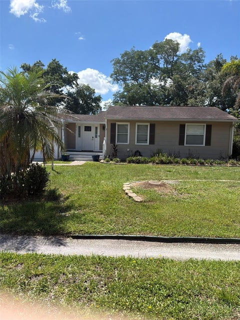 Photo of 4915 W Bartlett Drive, Tampa, FL 33603 (MLS # A4711057)