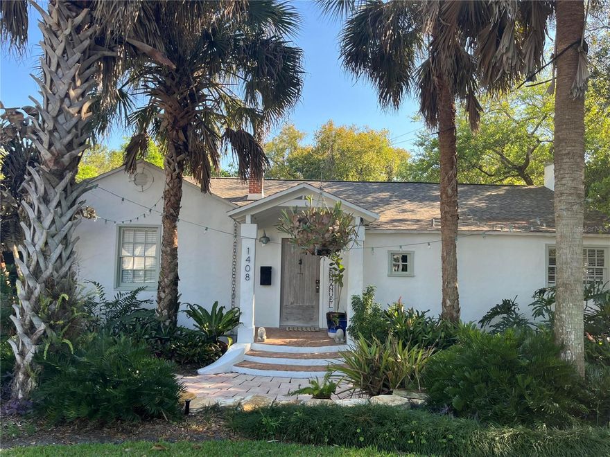 Welcome to this charming residence located in the heart of Orlando. This home boasts a spacious layout with abundant natural light and a beautifully professionally landscaped yard front and back. Located in one of Orlando's most desired neighborhoods, Landcaster Park, enjoy the convenience of a modern kitchen with updated appliances and ample cabinet space and large pantry. The property features comfortable bedrooms and an open  living area with vaulted ceilings and fireplace, great for relaxation and entertaining family and friends. The outdoor space includes a guest house with living area, kitchenette, full bath,  and private garden courtyard overlooking a plunge pool. The large backyard features a wood deck, a courtyard, a vegetable garden, and lawn area all great for outdoor entertainment. The home is built on two full city lots each 54.5' x 134.5' with room to expand or potential for two new homes. Located near local amenities and top rated schools this home provides easy access to everything Orlando has to accord.