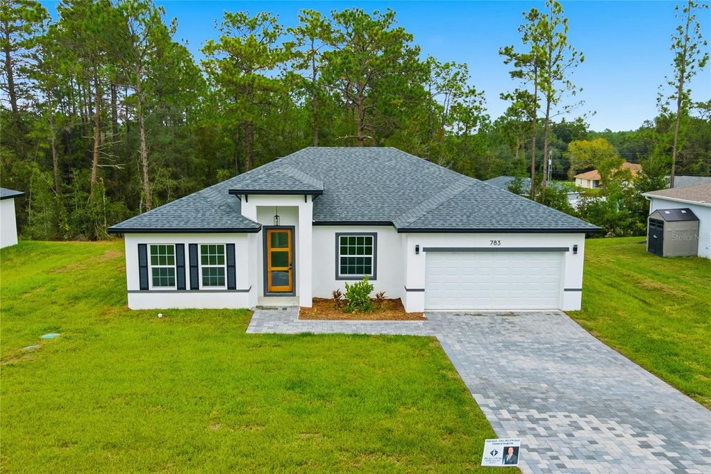 Photo of 783 Marion Oaks Trl, Ocala, FL 34473 (MLS # O6361842)
