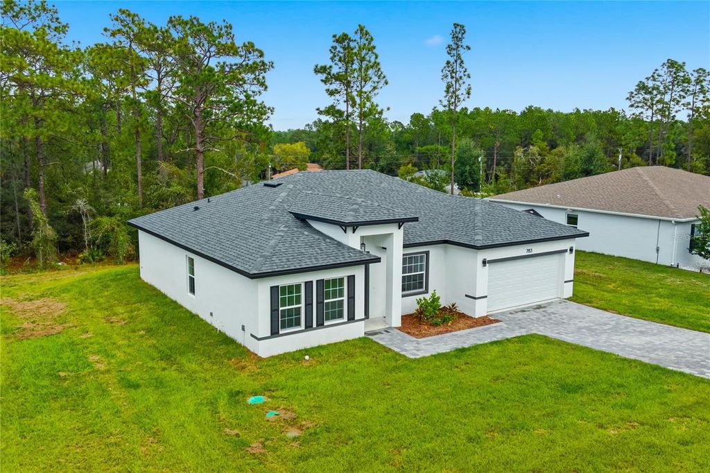 Photo of 783 Marion Oaks Trl, Ocala, FL 34473 (MLS # O6361842)