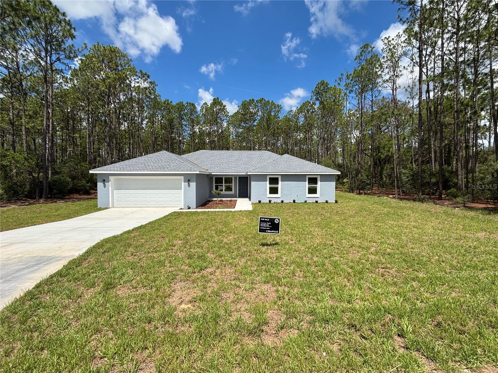 Brand-New “Parker II” Model on Nearly an Acre in Rainbow Acres now completed and move-in ready! Nestled on an expansive 0.95-acre lot surrounded by tall pine trees for natural privacy and tranquility. Featuring 3 bedrooms + a den, 2 bathrooms, and a bright, open-concept split floor plan, this home is designed for both everyday comfort and effortless entertaining. Enjoy luxury vinyl plank flooring throughout, solid stone countertops, and stainless steel appliances in a sleek, modern kitchen. The seamless layout opens to endless possibilities—host friends, create your dream backyard retreat, or build the pool you’ve always wanted. Wake up to peaceful mornings with coffee in your private setting, and spend weekends exploring nearby Rainbow Springs, just minutes away where you can enjoy kayaking, fishing, and outdoor adventure. This is one of the only Parker II models available for immediate occupancy—don’t miss your chance!
Note: Finishes, colors, and garage orientation may vary.