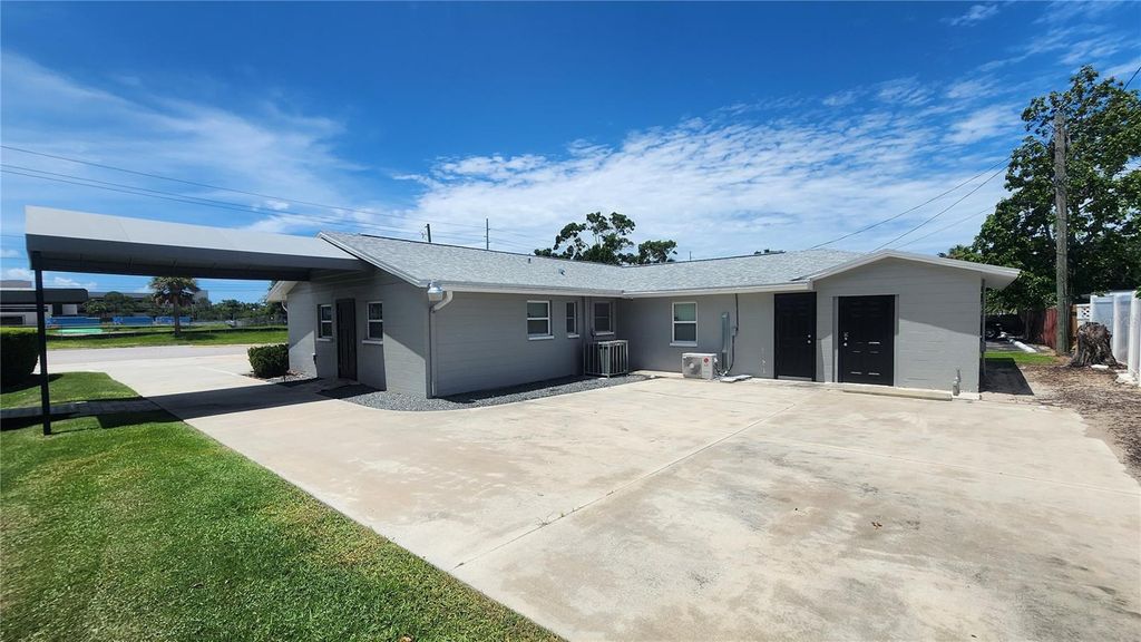 Photo of 5113 Memorial Highway, Tampa, FL 33634 (MLS # TB8457969)