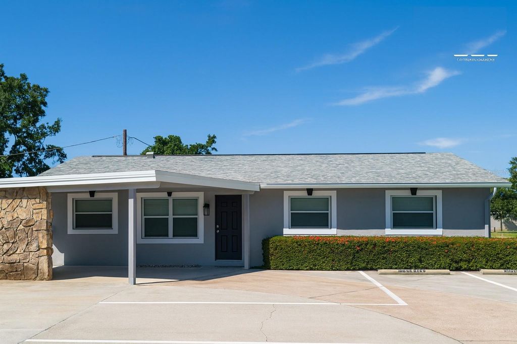 Photo of 5113 Memorial Highway, Tampa, FL 33634 (MLS # TB8457969)