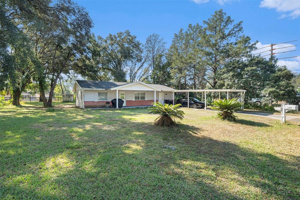 Photo of 15304 Pasco Lake Drive, Spring Hill, FL 34610 (MLS # TB8449983)