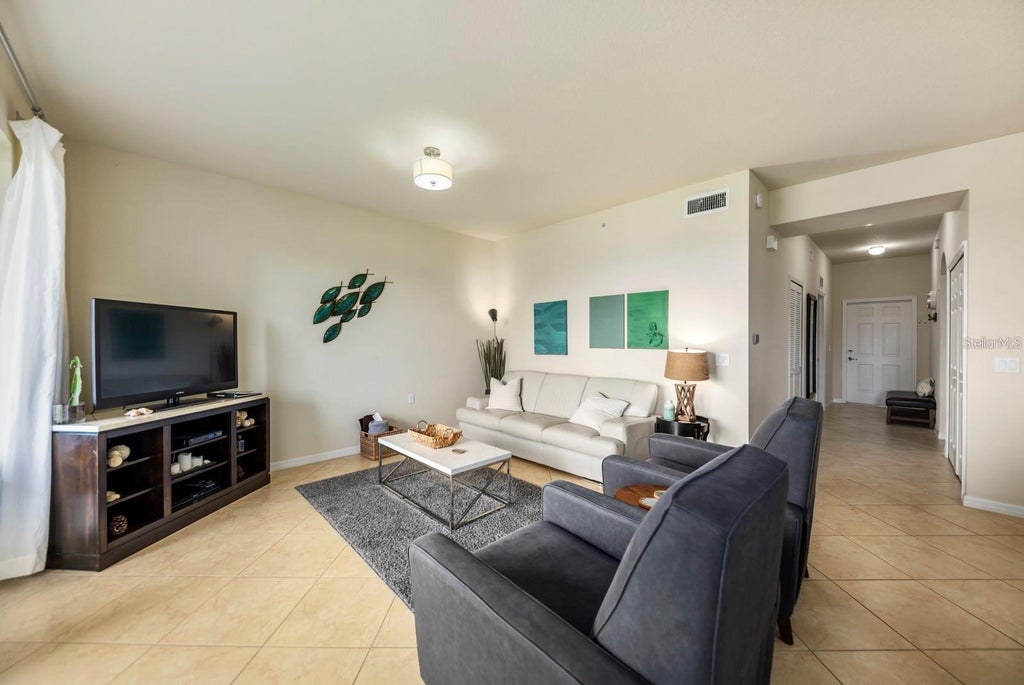 Photo of 7607 Grand Estuary Trail #207, Bradenton, FL 34212 (MLS # A4706092)
