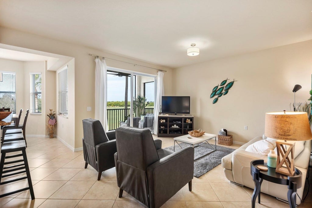 Photo of 7607 Grand Estuary Trail #207, Bradenton, FL 34212 (MLS # A4706092)