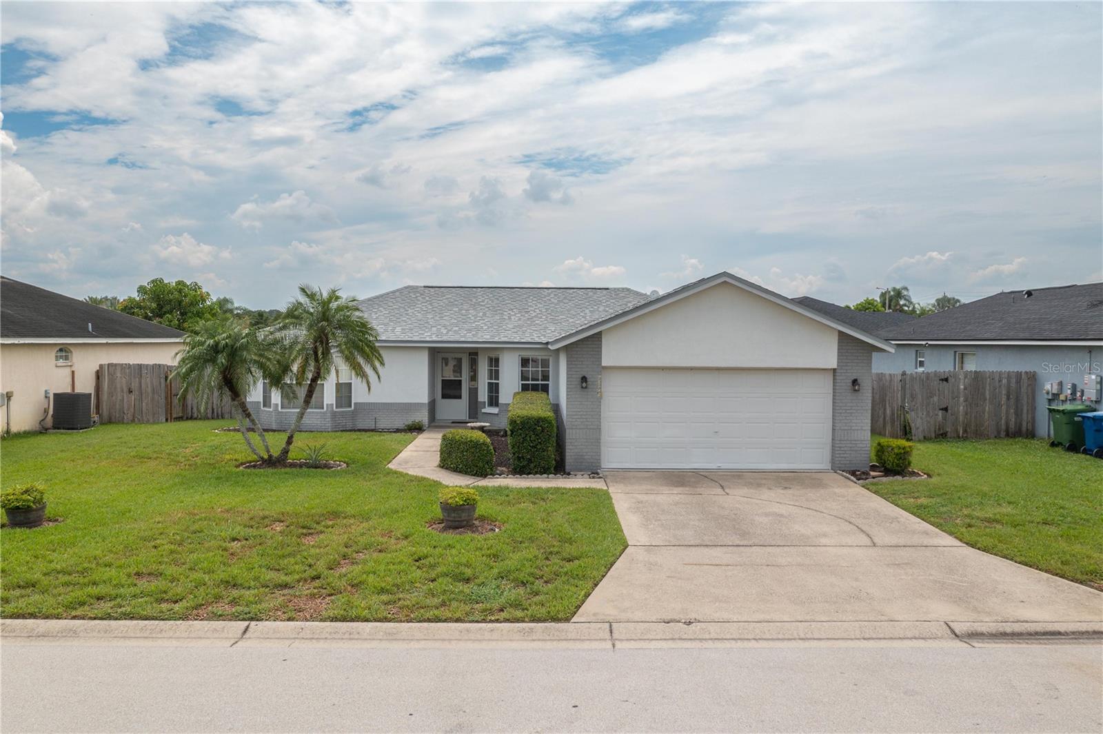 Welcome to 7109 Summit Drive, a charming and well-cared-for home located in the peaceful, deed-restricted community of Summit East. Offering 1,356 square feet of thoughtfully designed living space, this 3-bedroom, 2-bathroom home has been lovingly maintained by its original owner. The spacious primary suite features a large walk-in closet, a private bathroom with a walk-in shower, and an oversized linen closet. The split floor plan offers added privacy, with the second bedroom showcasing beautiful hardwood flooring and large double closets, while the third bedroom and primary suite are carpeted for comfort.
The home boasts a large, open-concept family and dining room with hardwood flooring, perfect for entertaining or everyday living. The kitchen includes a breakfast bar and a cozy eat-in nook, along with a laundry room conveniently located just off the kitchen, providing direct access to the 2-car garage. Ceiling fans are located throughout the home for added comfort and efficiency.
Step outside to a serene screened-in back porch and a beautifully maintained, fully fenced backyard—professionally installed by Danielle Fencing in October 2022. An irrigation system is in place to keep the yard lush and green year-round. With no rear neighbors, the setting offers privacy and tranquility, ideal for relaxing evenings or weekend gardening. Major updates include a new roof in 2022, new garage door springs in 2025, a recently replaced kitchen garbage disposal, and HVAC system installed in 2015 and serviced annually.
This home is ideally located near shopping, dining, Legoland, Highway 27, and the Polk Parkway, offering both convenience and a quiet retreat. Submit your offers on the FAR/BAR “AS-IS” Residential Contract (Rev. 7) with proof of funds or a mortgage pre-approval letter. Buyers and their agents are responsible for verifying all measurements, HOA details, and property information. Don’t miss out on this exceptional opportunity—schedule your showing today!