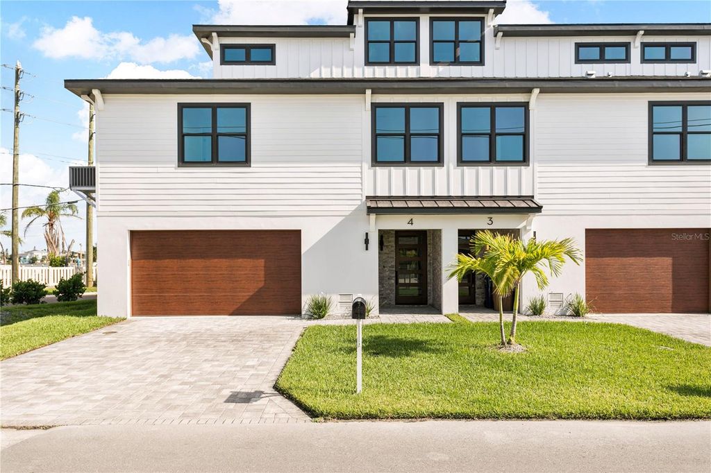 Photo of 187 145th Avenue E #4, St Petersburg, FL 33708 (MLS # TB8437744)