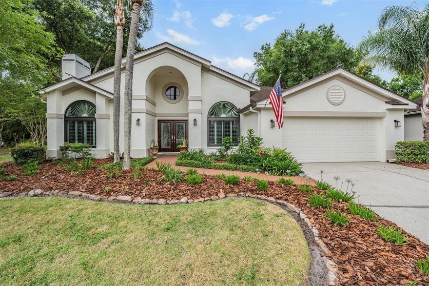 This immaculately maintained 4 bedroom, 2.5 bath pool home with 2,460 square feet of living space is a must see.  Situated on a quiet cul de sac on the far end of the Creekside at Cross Creek community, this property sits on a large lot and backs up to an expansive conservation area.  Pride of ownership shows up immediately as you pull up to the home and notice the recently painted exterior, stunning curb appeal and beautifully manicured landscaping.  The expansive covered porch with the double solid wood door entry is both welcoming and impressive.  As you enter into foyer with soaring ceilings and designer chandelier, you'll notice the freshly painted interior throughout.  A formal dining room with newer wood floors sits to the right of the entry.  To the left, there is the formal living room with an impressive marble accented fireplace. This room could also serve as amazing home office or den. Crown moulding and plantation shutters complete these rooms and continue throughout the home.  As you continue into the home, you'll enter the large and inviting family room with tall ceilings and a view to the outside entertaining area.  The large kitchen with breakfast nook is adjacent to the family room and features upgraded stainless steel appliances, granite counters, solid wood cabinets and plenty of storage. A powder room with Kohler fixtures and lovely pedestal sink is tucked away at the corner of the family room. The thoughtful split bedroom floor plan allows for a private owner's retreat to the left of the family room. The owner's retreat features direct access to the covered lanai, an amazing en suite bathroom with dual vanities, a garden tub, large frameless shower and large walk in closet. The well sized secondary bedrooms are located on the other side of the home and all feature walk in closets.  The secondary bedrooms share a full bath with access to the lanai and pool area.  The outside oasis is something to be seen! Triple sliders from the family room open to a covered lanai with gorgeous travertine decking that continues around the entire pool deck.  The designer pool has a PebbleTec finish, water features and newer Pentair pool filter. The pool enjoys the cover of the screen enclosure. The expansive back yard has been designed for minimal maintenance and has tons of space beyond the pool area.  Finishing off the floor plan is an inside laundry room which leads to a large two car garage. Bonus feature: Professionally installed closet systems throughout. Creekside at Cross Creek has very reasonable HOA fees and NO CDD.  Don't let the quiet and private feel of the property fool you - it's conveniently located just off Bruce B Downs and Cross Creek Blvd with quick access to I-75, local shopping, dining and entertainment.