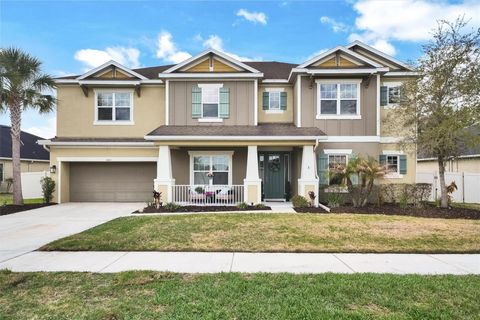Photo of 1611 Tilted Cypress Place, Wesley Chapel, FL 33544 (MLS # TB8484015)