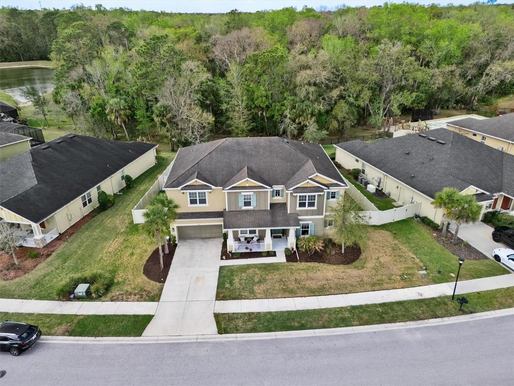 Photo of 1611 Tilted Cypress Place, Wesley Chapel, FL 33544 (MLS # TB8484015)