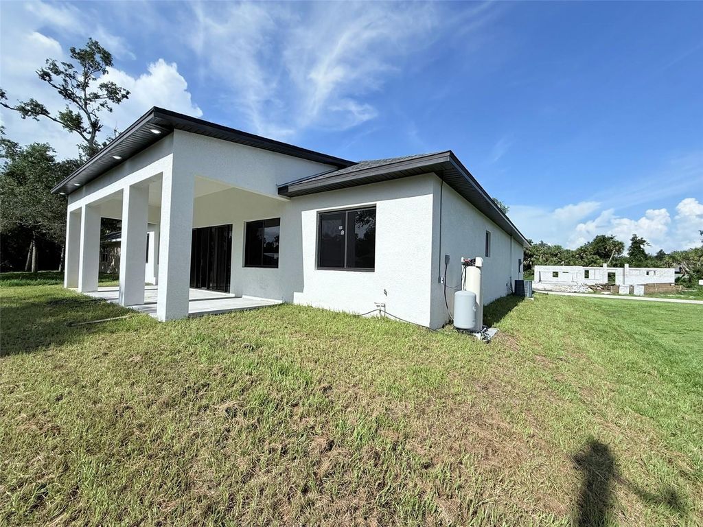 Photo of 275 Lecturn Street, Port Charlotte, FL 33954 (MLS # O6327277)