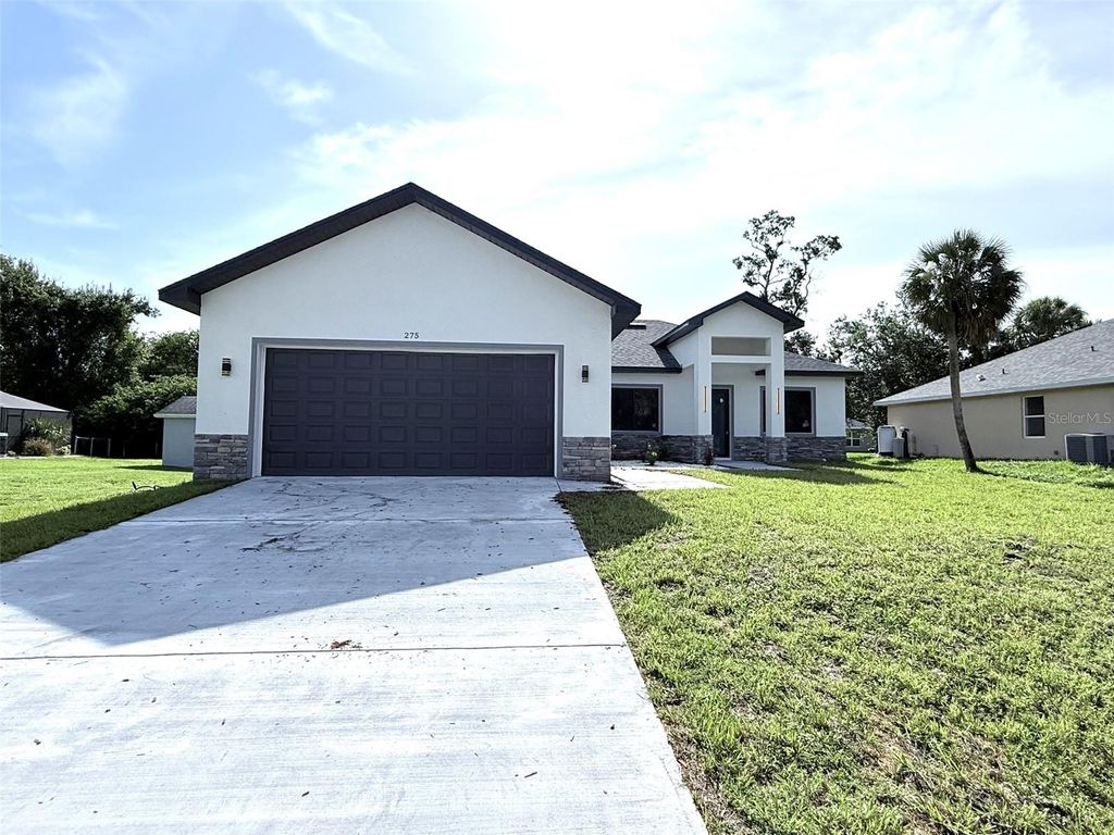 Photo of 275 Lecturn Street, Port Charlotte, FL 33954 (MLS # O6327277)