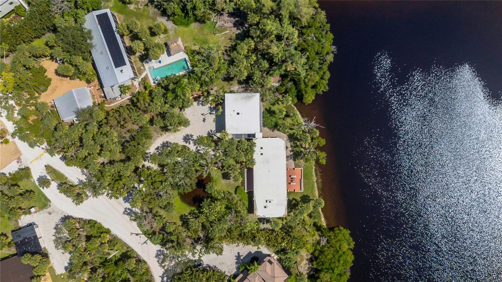 Photo of 62 S Sandy Hook Road S, Sarasota, FL 34242 (MLS # A4667491)