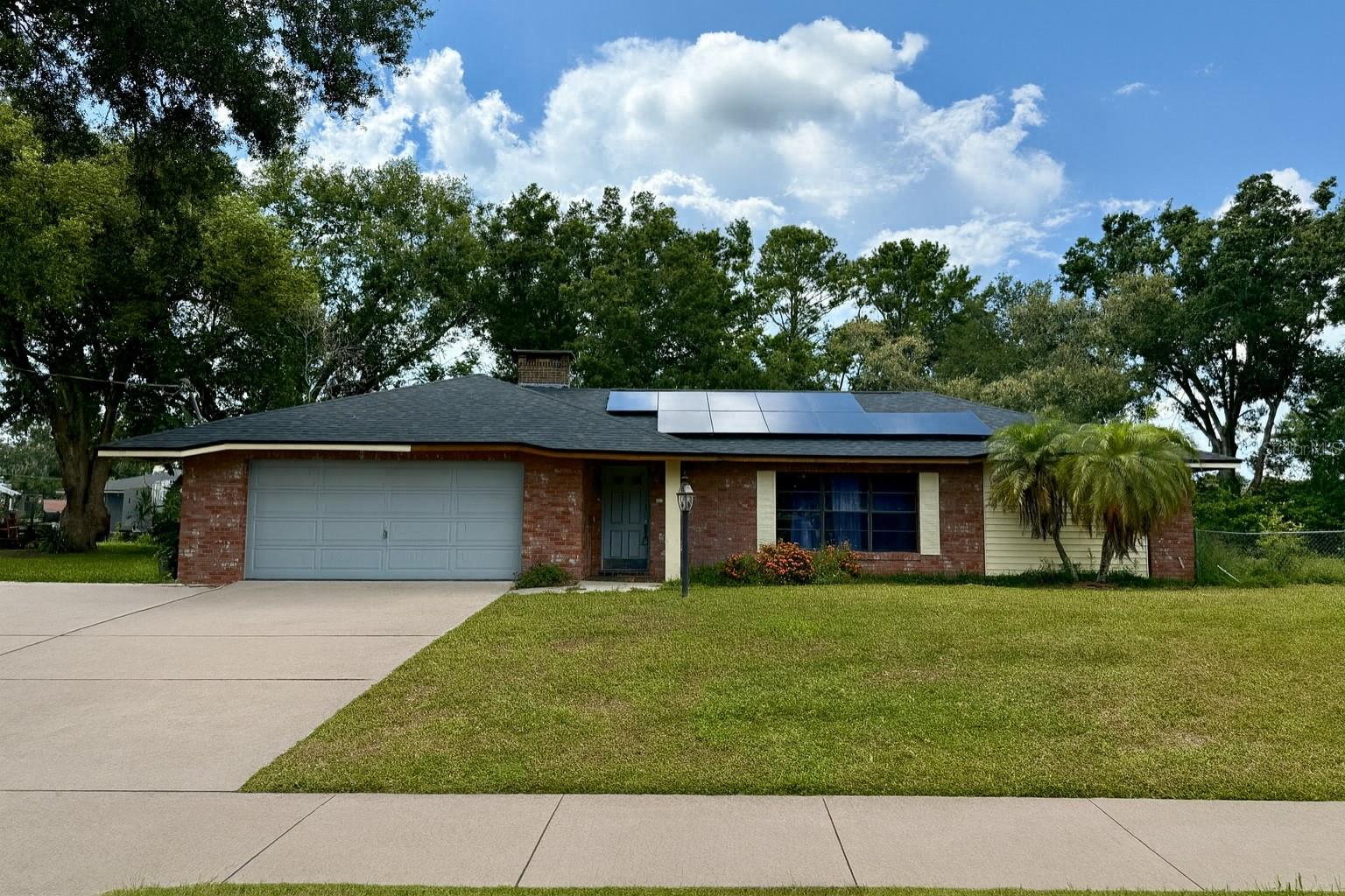 Short Sale. Trustee Sale.
Don’t miss this solid 4-bedroom, 2-bath pool home located in a quiet, established Auburndale neighborhood. Solar panels connected to the home help lower utility costs year-round. This property is vacant and sold AS-IS, offering an incredible chance for investors or buyers willing to add their personal touch. With some updates, the home has the potential to reach its RVM value in the $390K range — making it an extremely under-market deal with instant equity potential.
Inside, you’ll find a spacious split floor plan with oversized bedrooms, two separate living areas, a formal dining space, and a large kitchen ready for modernization. The master suite is set apart for privacy, while the guest bedrooms share a full bath with direct pool access. Outdoors, enjoy Florida living with a screened pool and patio, plus an oversized yard perfect for entertaining or storing your RV, boat, or toys.
The detached block outbuilding, complete with a new roof, offers even more opportunity — easily convert it into a mother-in-law suite, guest house, or large workshop to further increase value. This home needs some TLC but has good bones, a fantastic lot, and is ready for its next owner to bring it back to full potential.