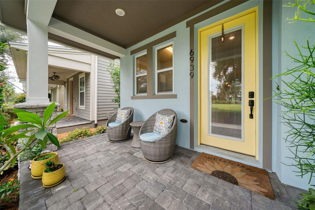 Photo of 6939 Higgs Alley, Orlando, FL 32827 (MLS # O6440091)