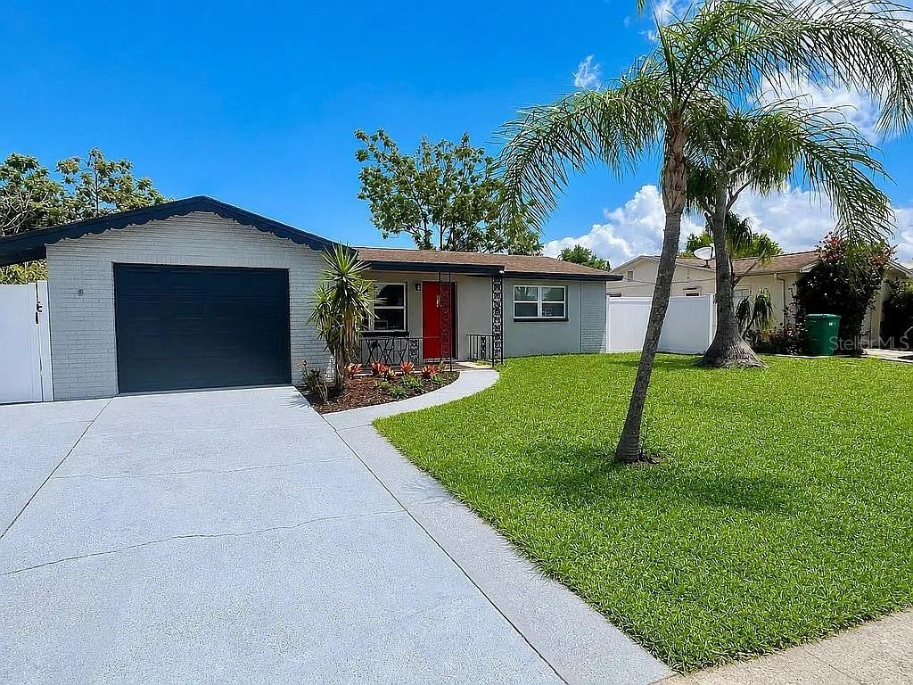 Photo of 3215 Kilburn Road, Holiday, FL 34691 (MLS # TB8551707)