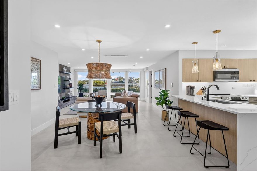 Experience effortless coastal luxury in this brand-new residence, thoughtfully designed and new built from the studs on in. Professionally staged to showcase the very best of waterfront living. Offered fully furnished and truly turnkey, this stunning 2-bedroom, 2-bath home allows you to move right in—or begin generating rental income—without lifting a finger.
Perfectly positioned on the Intracoastal Bayfront, this home delivers sweeping water views where you can watch boats glide by throughout the day, enjoy glowing sunsets in the evening, or cast a line from the dock for a relaxing day of fishing. The open-concept layout is filled with natural light and enhanced by high-end finishes, coastal-inspired furnishings, and carefully curated décor that blends comfort with sophistication.
The kitchen flows seamlessly into the living and dining areas, making it ideal for entertaining or quiet nights at home, while both bedrooms are generously sized and designed as private retreats. The primary suite offers a spa-like bathroom and tranquil ambiance, while the guest room provides comfort and privacy for visitors.
Beyond the residence, the amenity-rich community elevates the lifestyle even further. Enjoy two beautifully maintained, heated swimming pools, a pickleball/tennis court, a fully equipped fitness center, and two expansive clubhouses with on-site rental facilities—perfect for hosting gatherings or accommodating guests. Best of all, you’ll have private beach access, offering the rare luxury of both bayfront living and effortless access to the Gulf.
Whether you’re seeking a full-time residence, a vacation retreat, or a high-demand investment property, this exceptional bayfront home delivers new construction inside, turnkey convenience, and resort-style amenities in one remarkable package. This is coastal living at its finest—refined, relaxed, and ready for you.