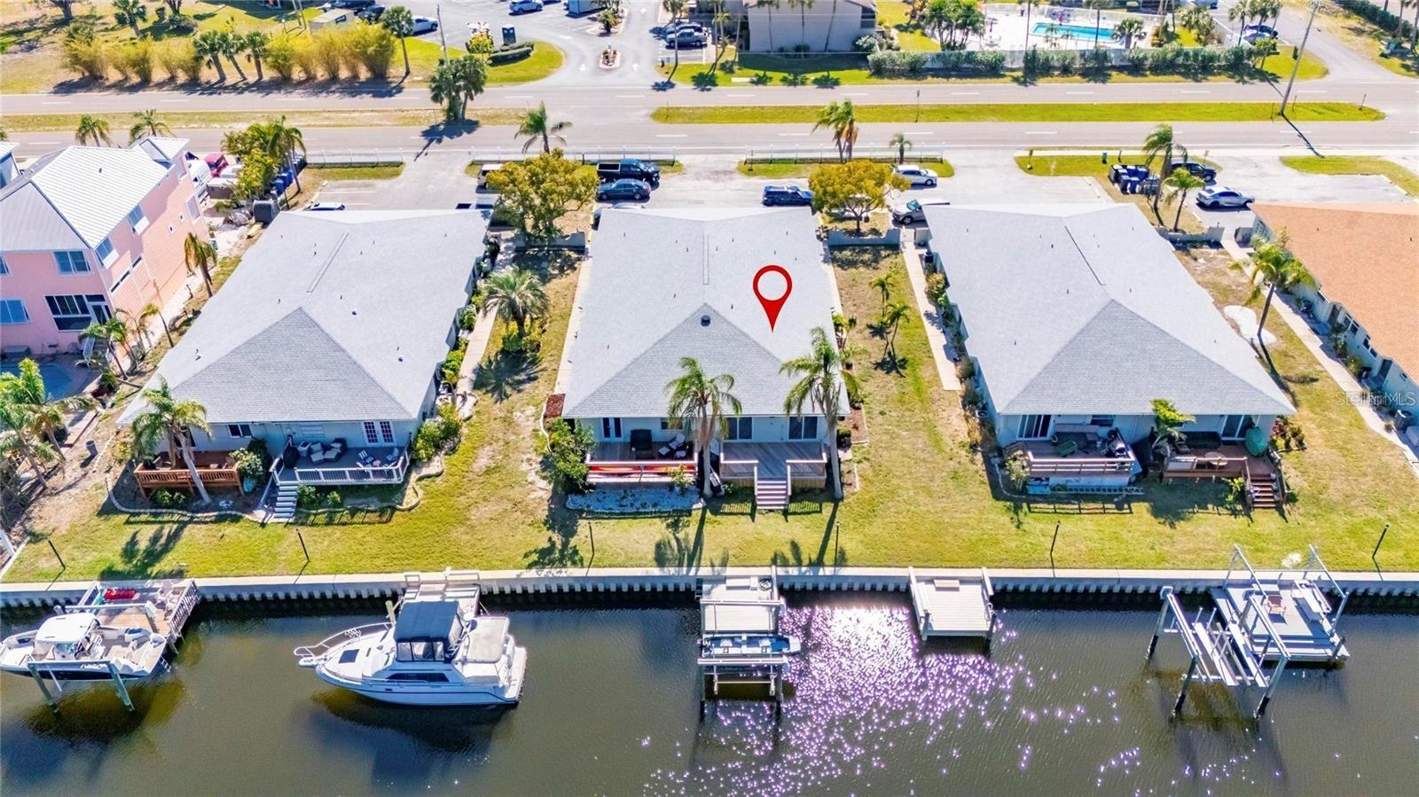 APOLLO BEACH - COMPLETELY RENOVATED - BETTER THAN NEW - WATERFRONT CONDO WITH PRIVATE BOAT DOCK AND LIFT– 3 Bedrooms, 2 Bathrooms- Never Flooded! Experience the Florida lifestyle in this spacious end unit that features an open floor plan that seamlessly blends the inviting kitchen and living room with the private backyard patio deck overlooking the water. Relax and unwind as you take in breathtaking water views and enjoy this slice or paradise. This is the most sought-after condo in the complex with its prime location and generous size. Located in THE HEART OF APOLLO BEACH makes it an ideal spot with easy access to I-75, pristine beaches, shopping, restaurants, hospitals, restaurants and much more. Must See! This condo is also for sale. TB8353982