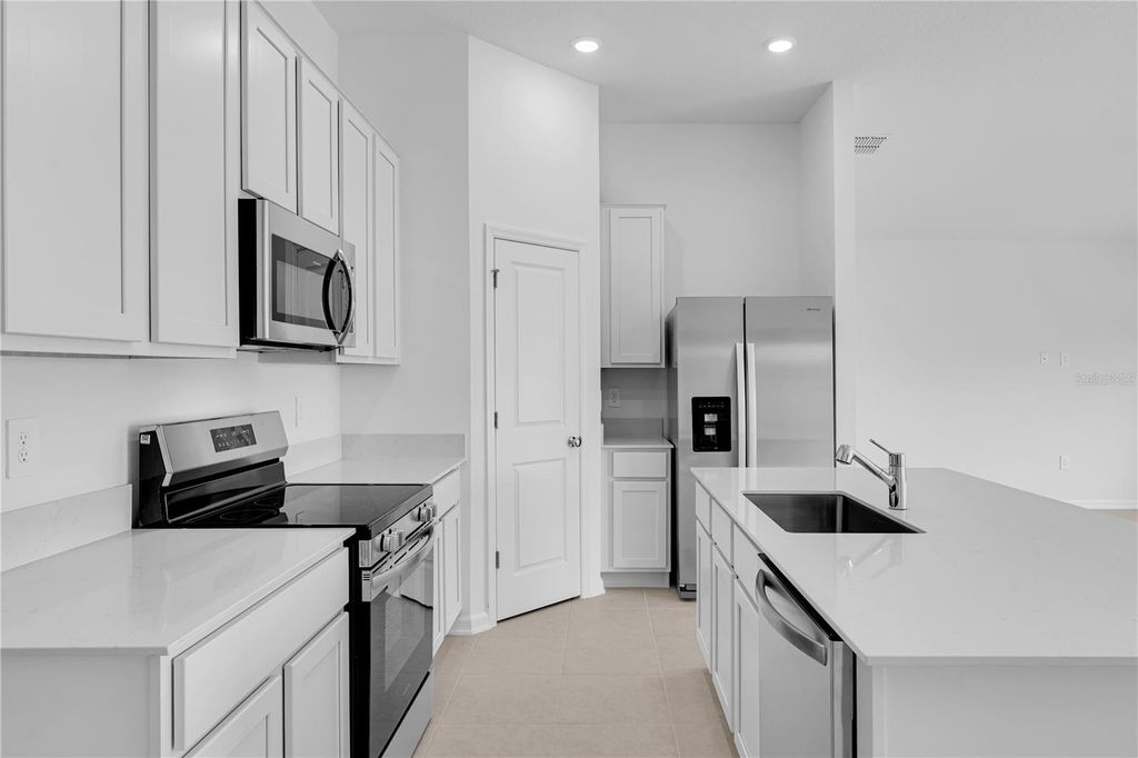 Photo of 5803 Le Marin Way, Kissimmee, FL 34758 (MLS # O6409758)