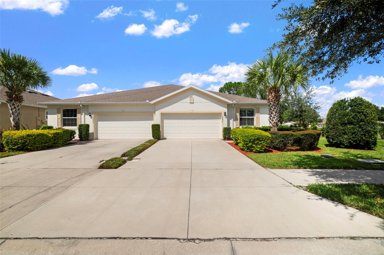 This beautifully upgraded end-unit villa is move-in ready and full of thoughtful touches. Inside you’ll find granite countertops in the kitchen and bathrooms, plantation shutters, upgraded fans and fixtures, a stylish kitchen backsplash, and vinyl flooring in the bedrooms. The master closet is custom built, the garage has overhead storage, and the fenced backyard with a screened-in back porch is perfect for relaxing. Plus, enjoy the convenience of a water softener and reverse osmosis filtration system.
The Watergrass community has it all—3 pools, fitness center with playroom, tennis courts, dog park, splash pad, and a clubhouse you can rent for private events. Families will appreciate the on-site elementary school and golf cart friendly community.
Enjoy low-maintenance living with HOA covering your roof, exterior paint, pesticide services, irrigation and lawn maintenance!
Live close to it all—Publix, Starbucks, and Chick-fil-A are under a mile away. With the new I-75 entrance on Overpass Road, The Grove, Wiregrass Mall, and Tampa Premium Outlets are just a short drive!
Don’t miss the chance to call this home yours!Quick move in available