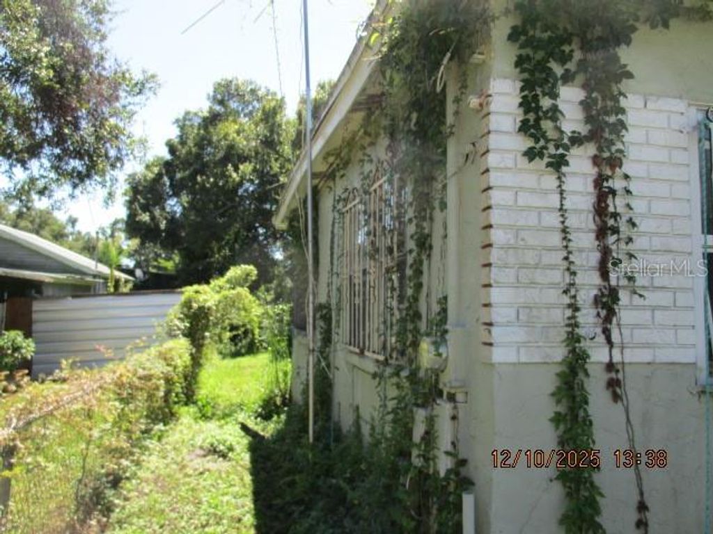 Photo of 1740 W Powhatan Avenue, Tampa, FL 33603 (MLS # W7879822)