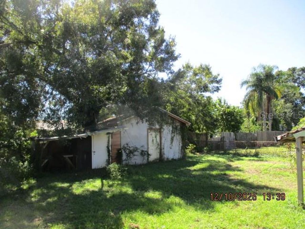 Photo of 1740 W Powhatan Avenue, Tampa, FL 33603 (MLS # W7879822)