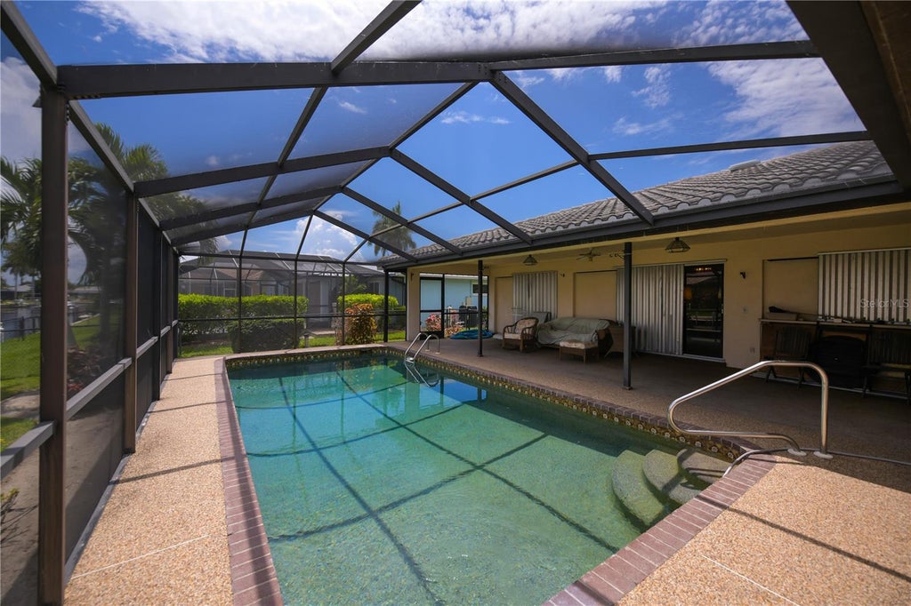 Photo of 1205 Via Tripoli, Punta Gorda, FL 33950 (MLS # C7530016)