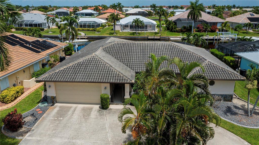 Photo of 1205 Via Tripoli, Punta Gorda, FL 33950 (MLS # C7530016)