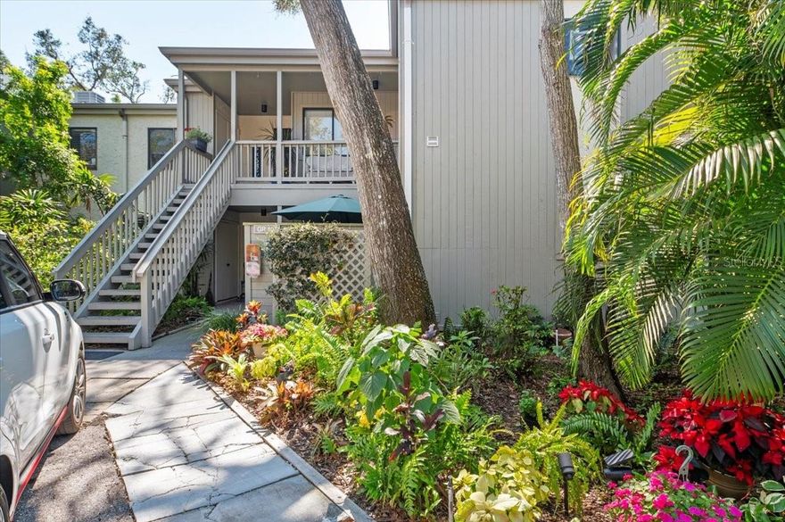 Experience the epitome of coastal living in the Pelican Cove, everything in this condo is exquisitely done and no expense was spared with new flooring throughout, new lighting, updated bathrooms, new kitchen with all new appliances, sink, lighting, counters and backsplash. Revel in the natural light that pours in through the side/end windows, illuminating the craftsmanship within.   Unwind (or entertain) on your glass-enclosed (1) lanai space, (2) front OR (3) side private courtyard.  Spread across 75 acres of pristine, gated waterfront property, Pelican Cove is a tropical oasis teeming with amenities. Discover an 86-slip boat harbor, six heated swimming pools, a hot tub, three clubhouses, lighted tennis and pickleball courts, shuffleboard, basketball, dog walking areas, and over 5 miles of walking trails/boardwalks. Unleash your creativity with art studios, a pottery classroom, woodworking, and sculpting, or attend classes at Pelican Cove University. This community also offers evening jazz and classical music concerts, ensuring an enriched lifestyle for all.